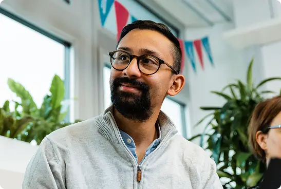 man with beard and glasses