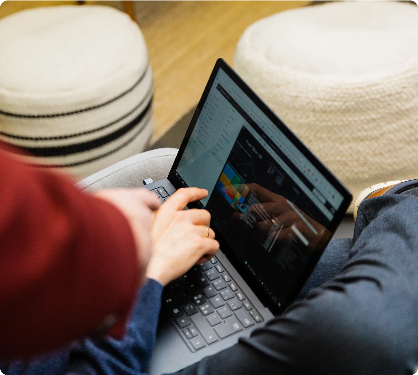 Person using laptop to access cloud services